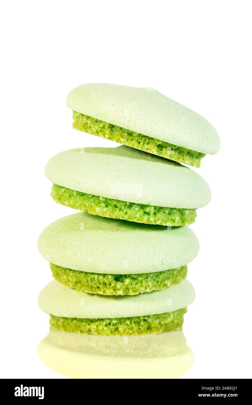Round biscuits or macarons stack, isolated on white background, green color Stock Photo