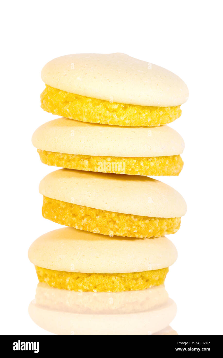stack of sweet biscuits or cookies, isolated on white background, yellow colored Stock Photo