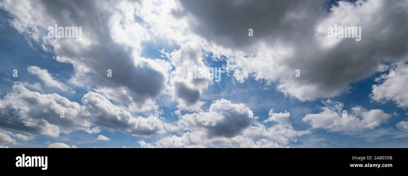 Blue sky with clouds in sunshine (wide background panorama Stock Photo ...