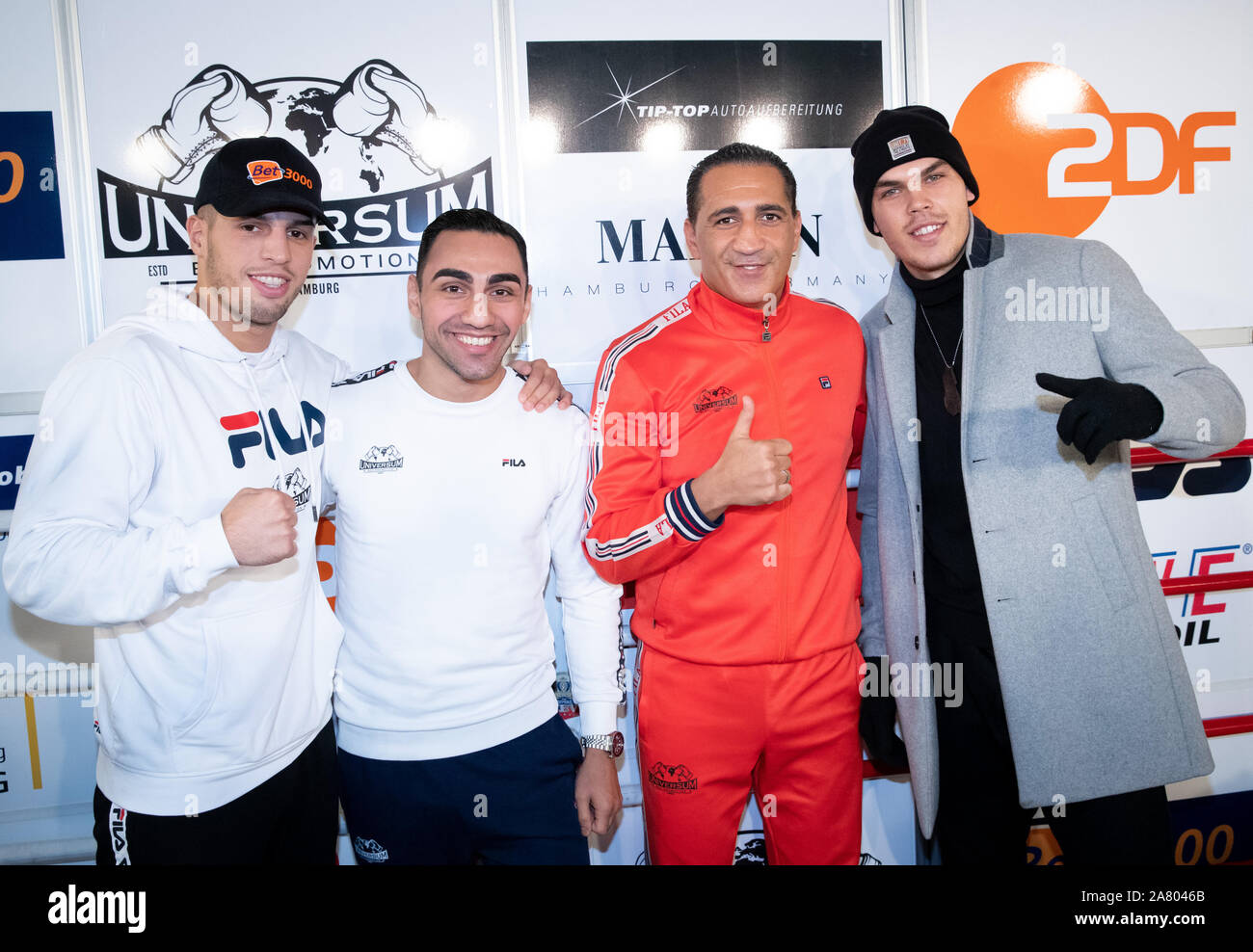 Hamburg, Germany. 05th Nov, 2019. Ismail Özen-Otto (2nd from right), Promoter Universum Box Promotion, and the boxers (l-r) Toni Kraft, Artem Harutyunyan and Leon Bauer are together after a press conference in the Box-Gym Universum. Harutyunyan from Germany and Islam Dumanow from Russia fight on 09.11.2019 for the IBO International title in super light weight. Credit: Christian Charisius/dpa/Alamy Live News Stock Photo