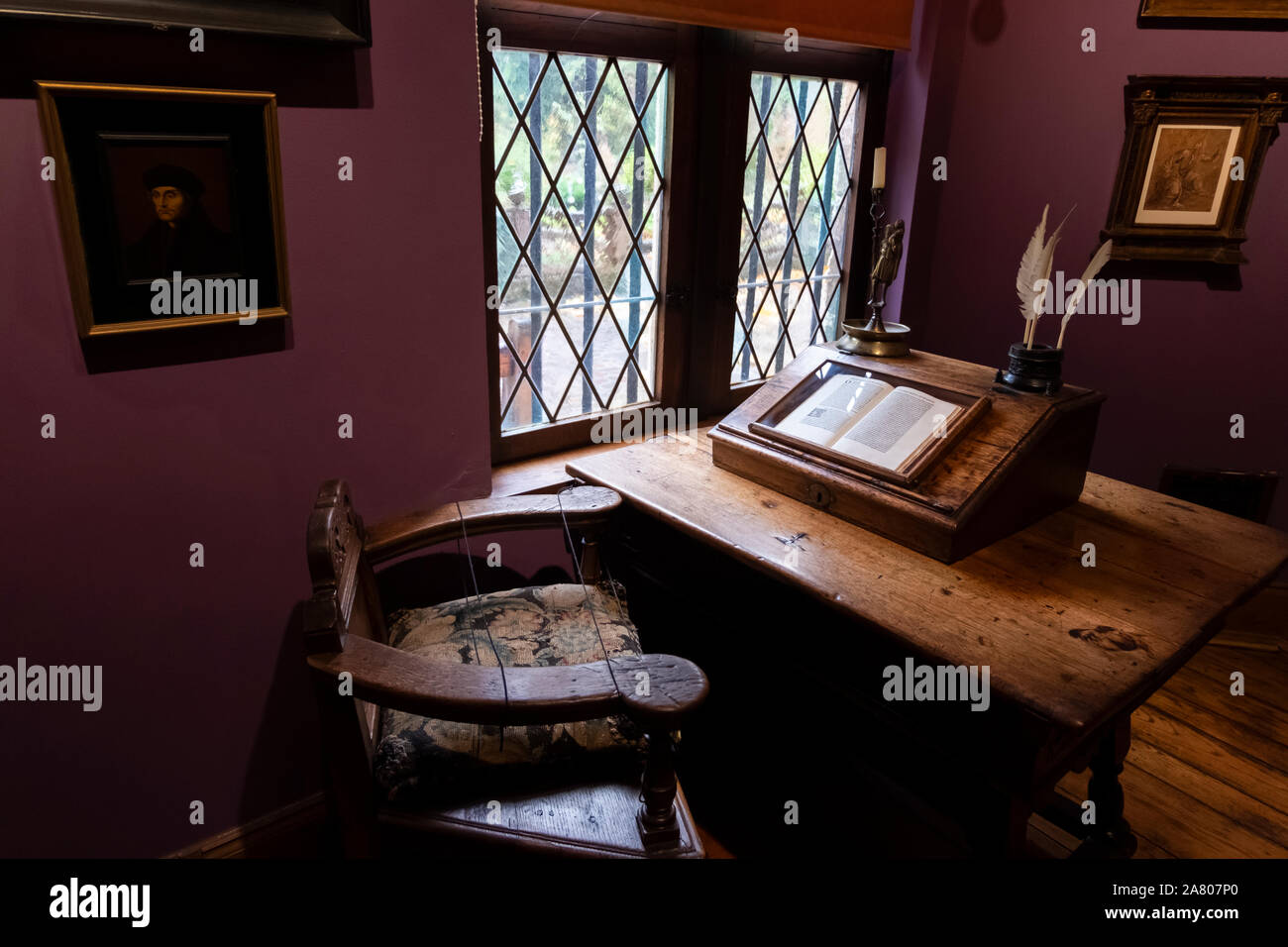 Brussels, Belgium - November 3 2019: Desk with old book in Latin about at the Erasmus house in Anderlecht. Stock Photo