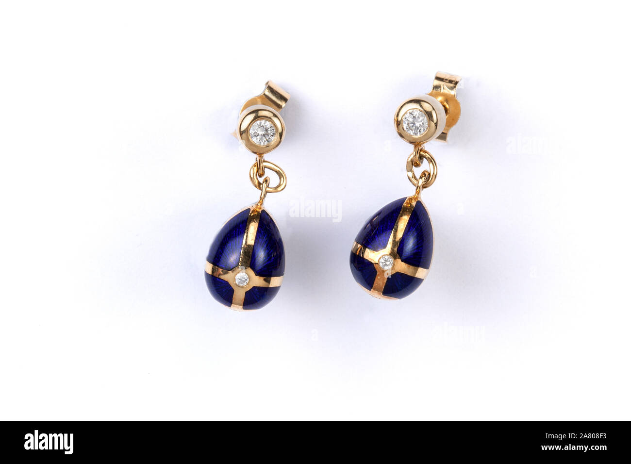 Fabergé gold,diamonds and enamel egg earrings. Stock Photo