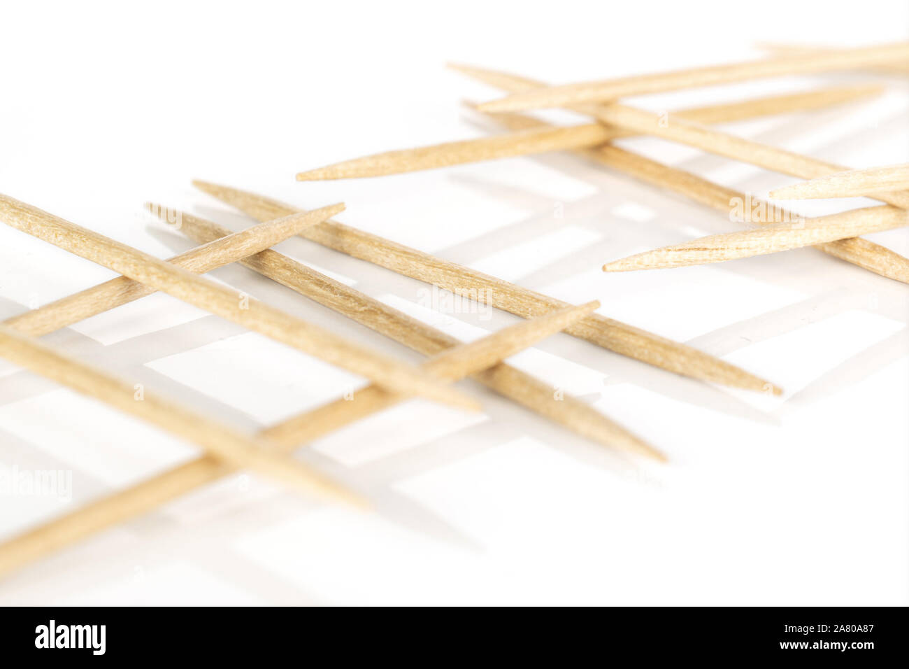 Lot of whole light wooden brown toothpick isolated on white background ...