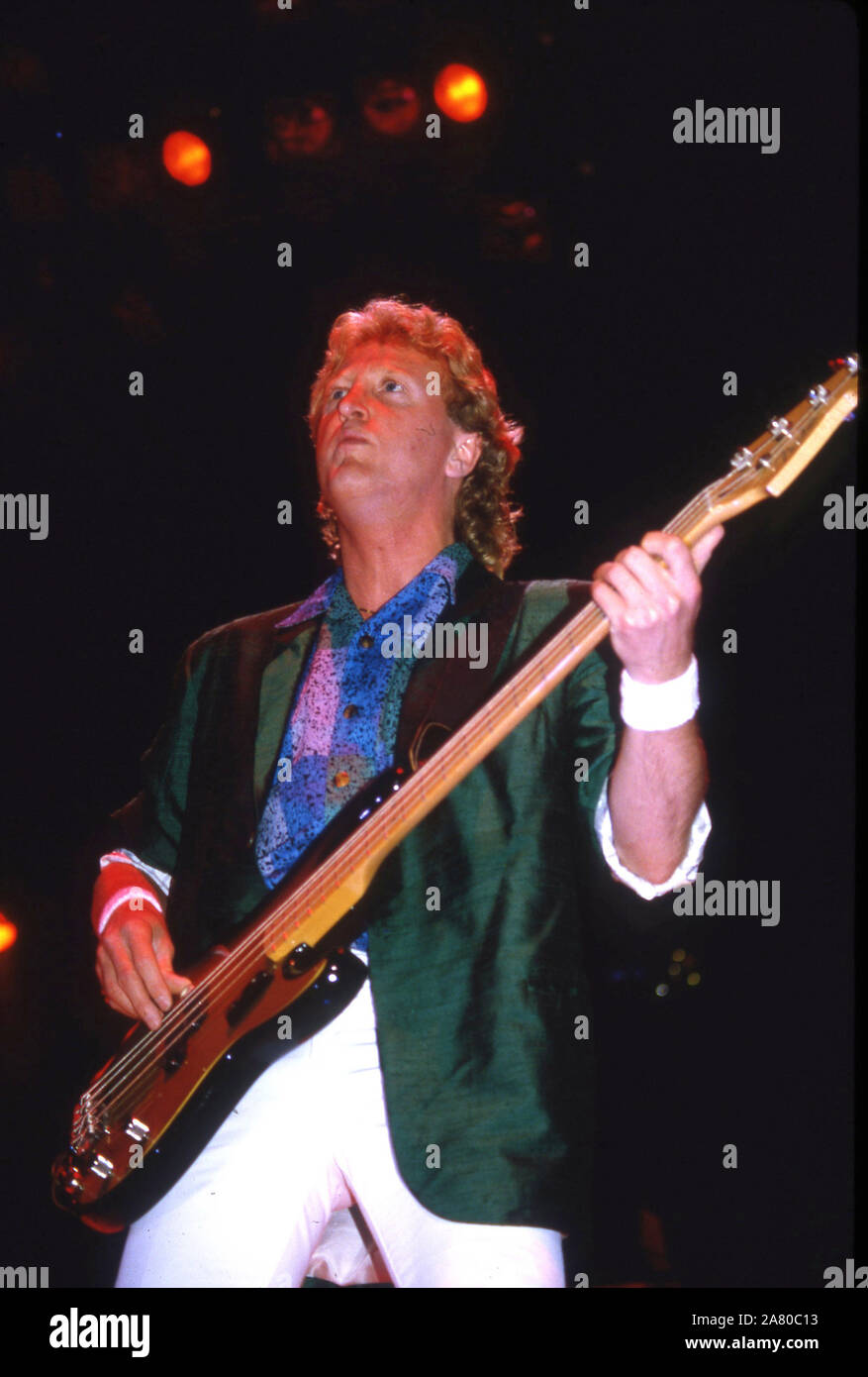 Foreigner on stage at Wembley Arena,London 1985,bassist Richard Wills Stock Photo