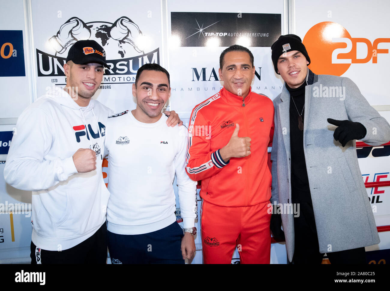 Hamburg, Germany. 05th Nov, 2019. Ismail Özen-Otto (2nd from right), Promoter Universum Box Promotion, and the boxers (l-r) Toni Kraft, Artem Harutyunyan and Leon Bauer are together after a press conference in the Box-Gym Universum. Harutyunyan from Germany and Islam Dumanov from Russia fight on 09.11.2019 for the IBO International title in super light weight. Credit: Christian Charisius/dpa/Alamy Live News Stock Photo