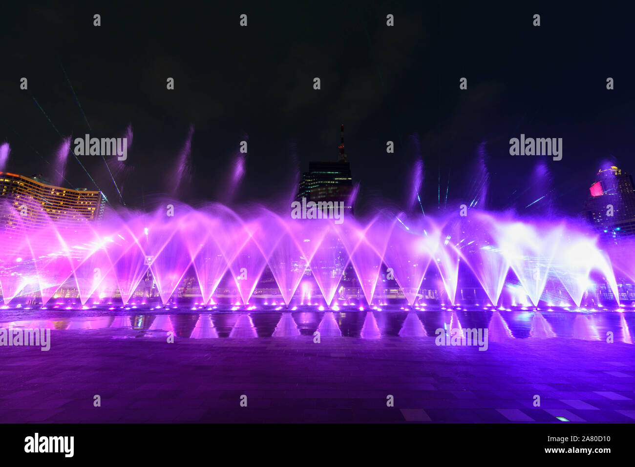 the fountain showing with lighting in night time Stock Photo - Alamy