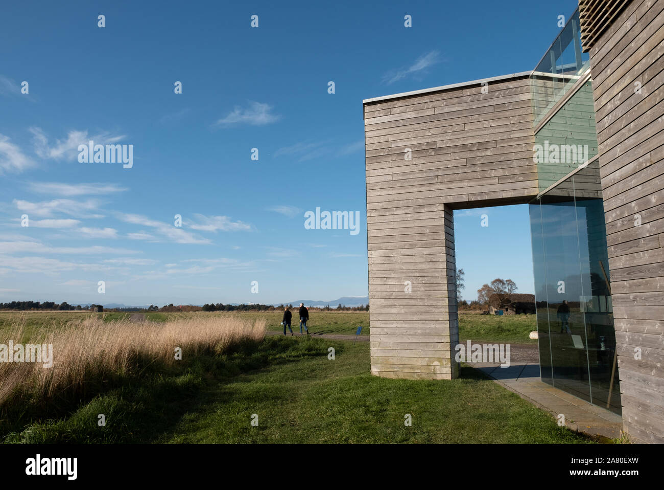 Section of the Culloden Moor visitor centre with Leanach cottage in the background, The site is run by the National Trust for Scotland. Stock Photo