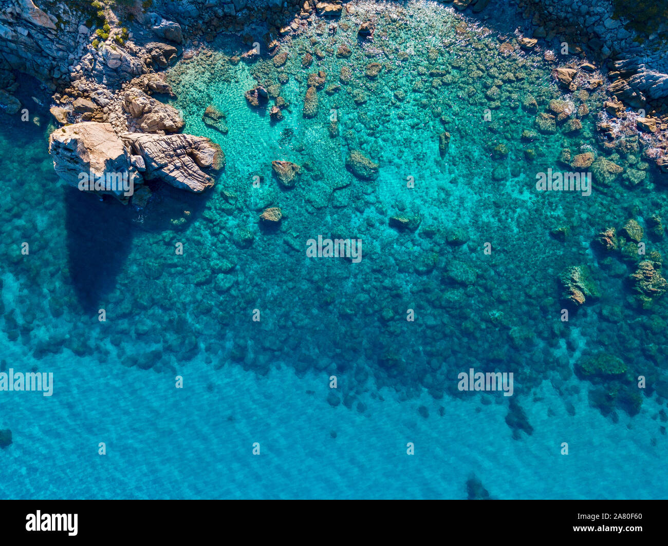 Aerial view of Tropea beach, crystal clear water and rocks that appear ...