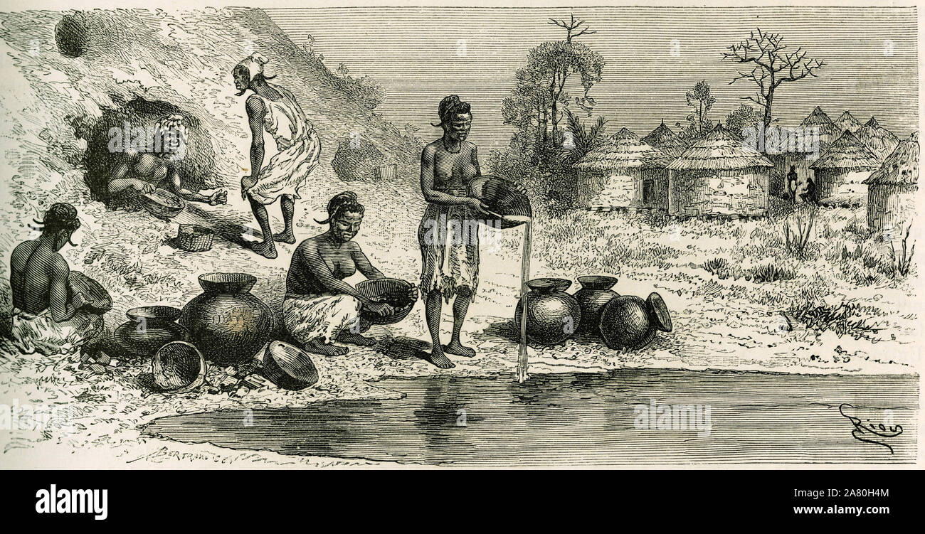 Les femmes du village de Koumakhana lavent l'or, en arriere plan, les hommes cherchent l'or dans des galeries souterraines. Gravure de Riou, pour illu Stock Photo