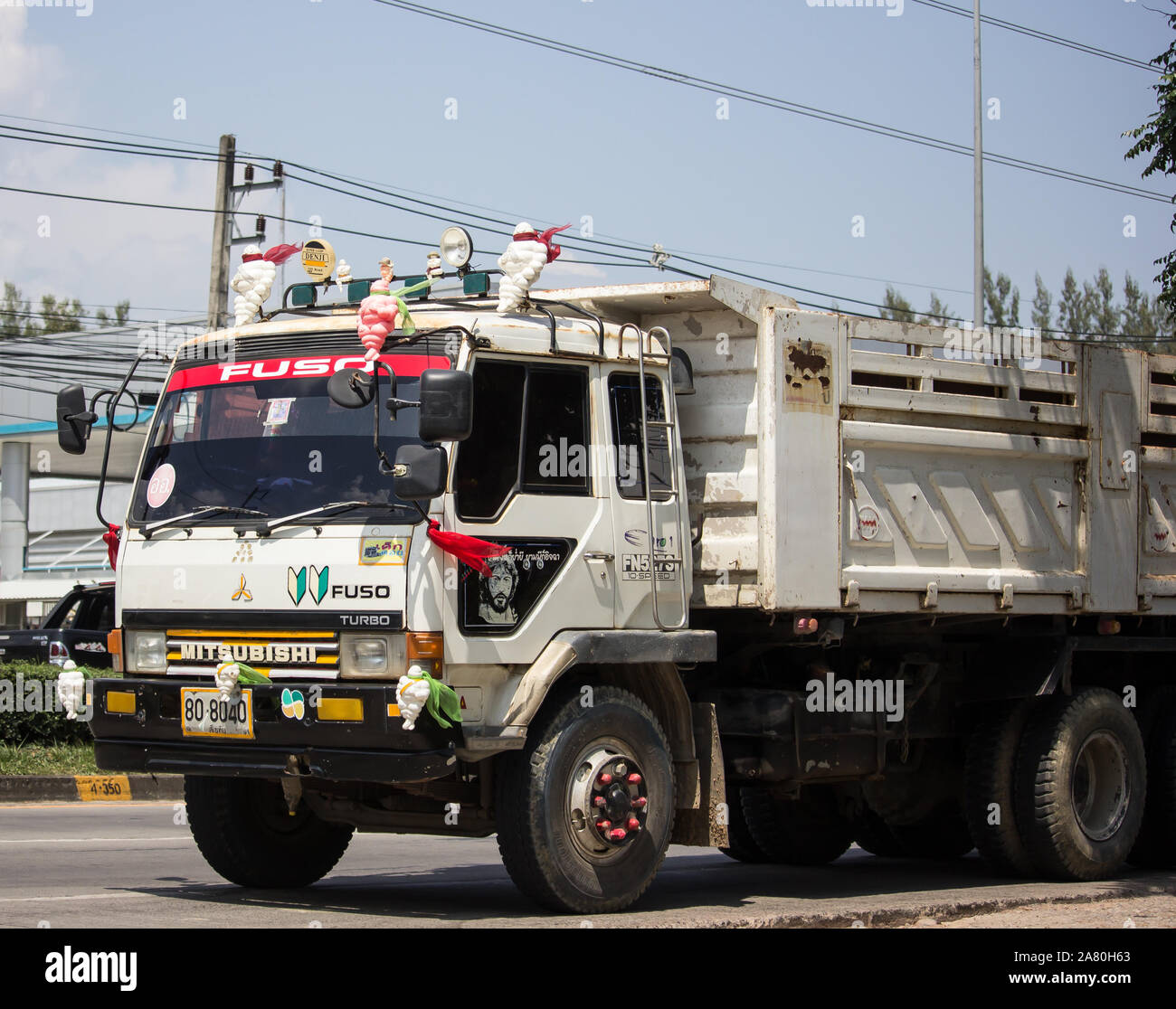 Chiangmai, Thailand -  October 10 2019:  Private Mitsubishi Fuso  Dump Truck.  Photo at road no.121 about 8 km from downtown Chiangmai, thailand. Stock Photo
