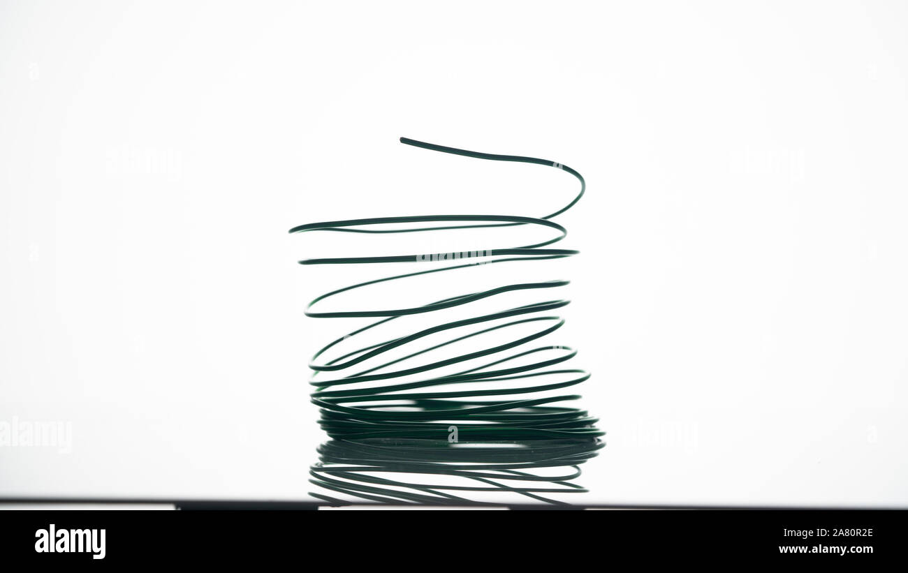 Metal wire on white background Stock Photo - Alamy