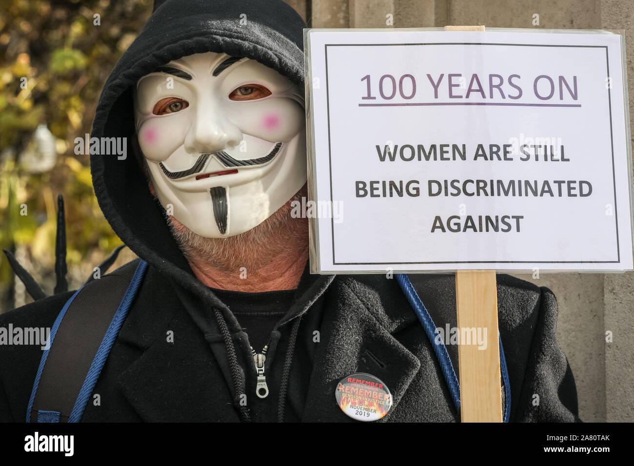 London, 05th November 2019. Women from the 'WASPI' (Women Against State Pension Inequality) campaign, many in colourful suffragette outfits, protest against what they perceive to be the unfair terms of their state pension and the way state pension age for men and women was equalised. The group stand in a chain of solidarity along the Houses of Parliament and later block a road on Parliament Square to shout about their cause. Credit: Imageplotter/Alamy Live News Stock Photo