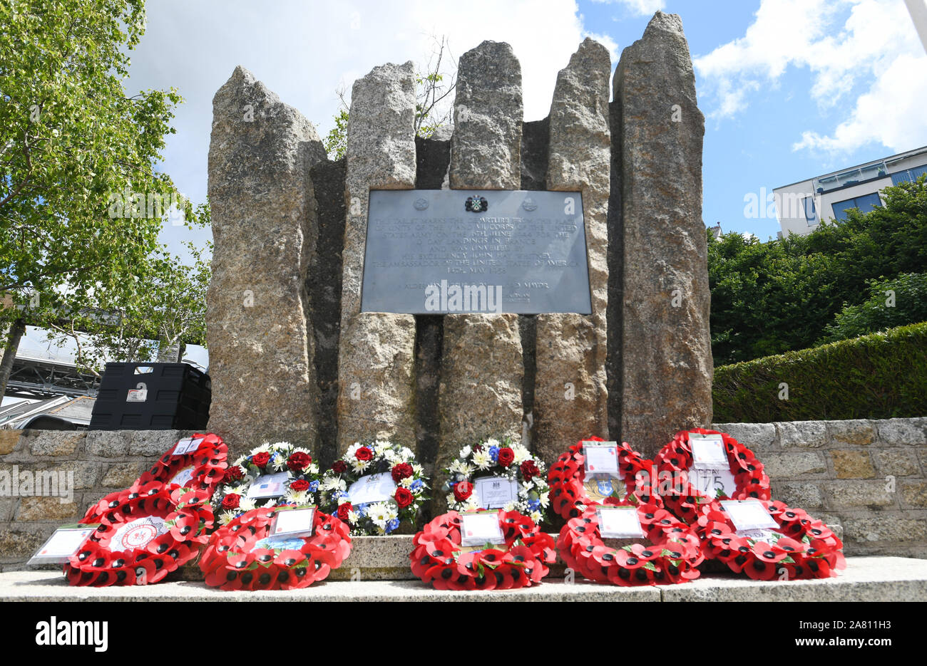 A Remembrance Service in commemoration of the 75th Anniversary of D-Day.Honouring the memory of thousands of British and Allied Servicemen who were based in the city the ceremony is held at  the American War Memorial, Saltash Passage. Pictured: Wreaths layed on  the American War Memorial, Saltash Passage.  Thursday 6th June 2019. Stock Photo