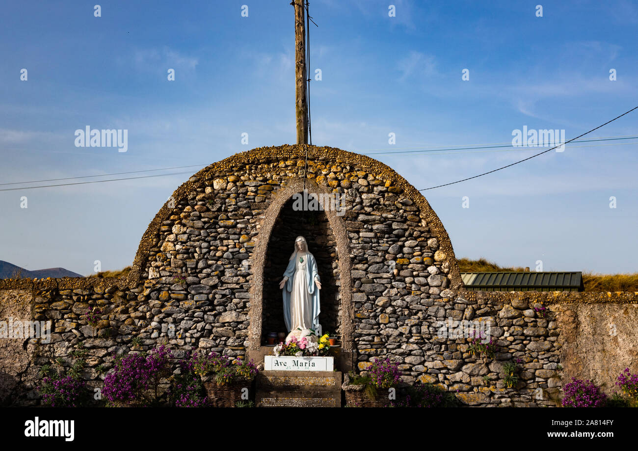 Old roadside shrine of the Virgin Mary in rural Ireland at sunrise,Ireland is famous for having a large amount of roadside grottos and Marian shrines Stock Photo