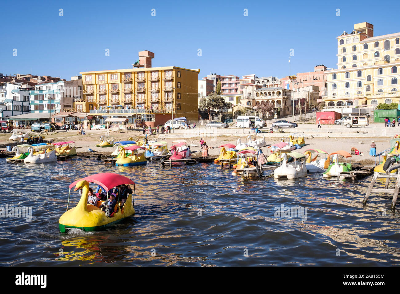 Local people riding on a duck-shaped boat in Copacabana beach, Bolivia Stock Photo
