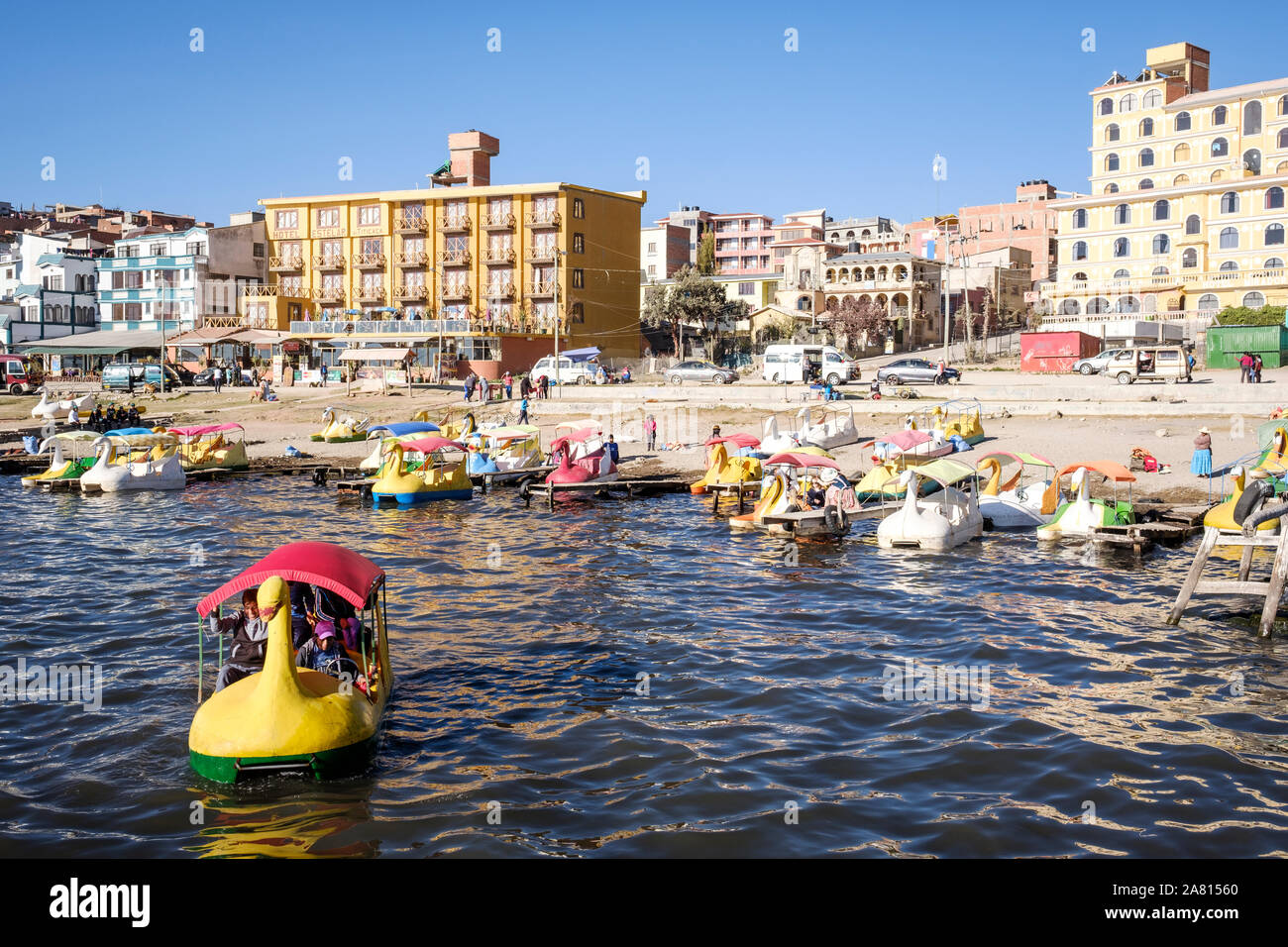 Local people riding on a duck-shaped boat in Copacabana beach, Bolivia Stock Photo