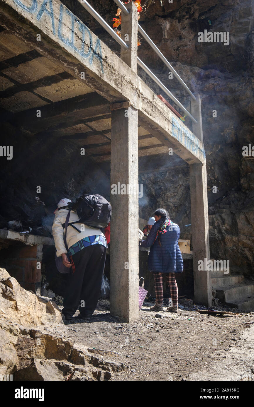 Local people at Cave of the Virgin of Lourdes near Copacabana, Bolivia Stock Photo