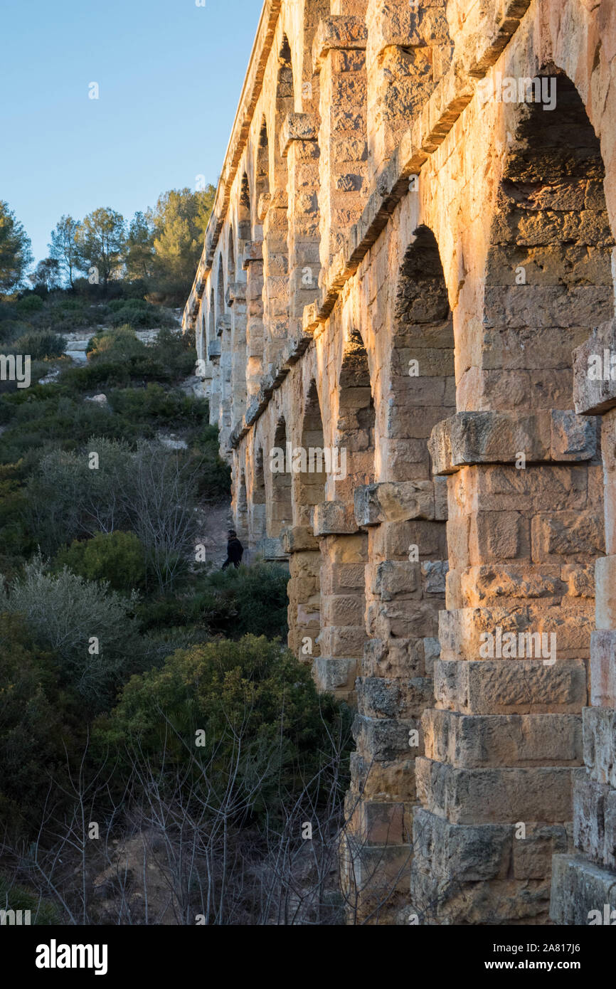 Tarragona Spain. Roman Ponte.Roman aqueduct with arches. Blue sky with