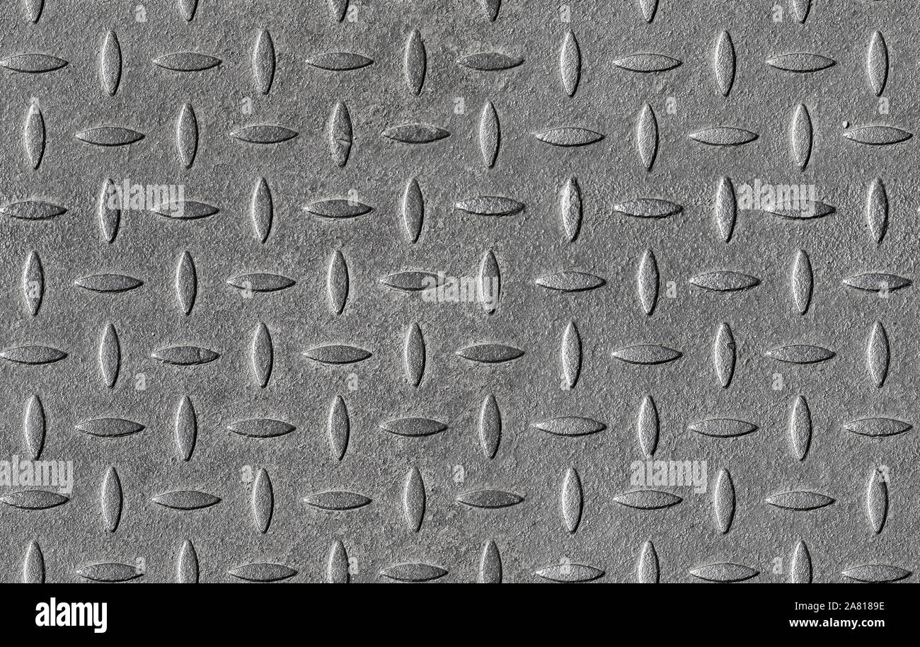 Gray diamond plate metal wall pattern. Seamless background photo texture, frontal view Stock Photo