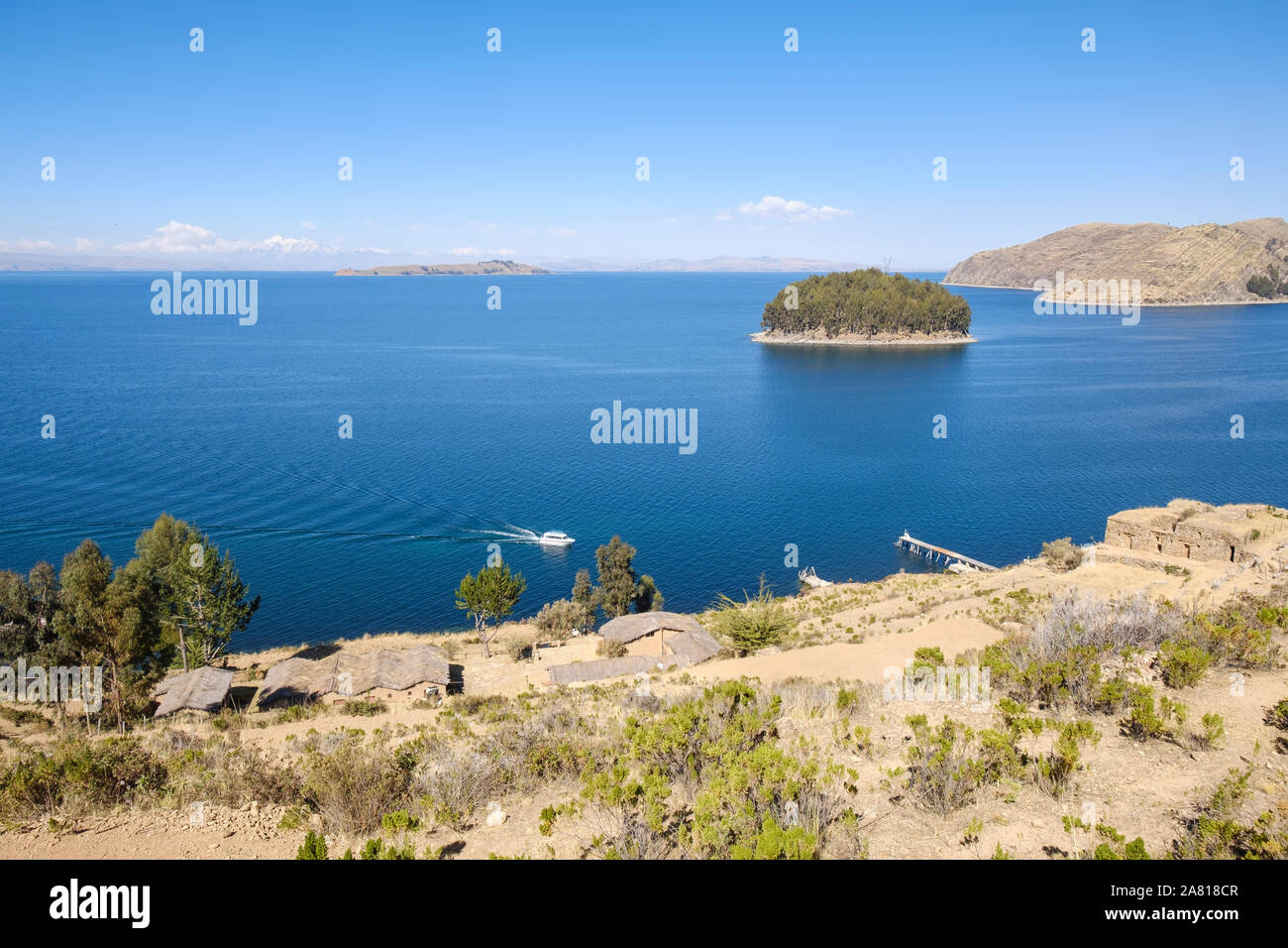 Scenic view from the Island of the Sun. Temple of the Sun ruins, Chillaca Island and Island of the Moon in the background, Lake Titicaca, Bolivia Stock Photo