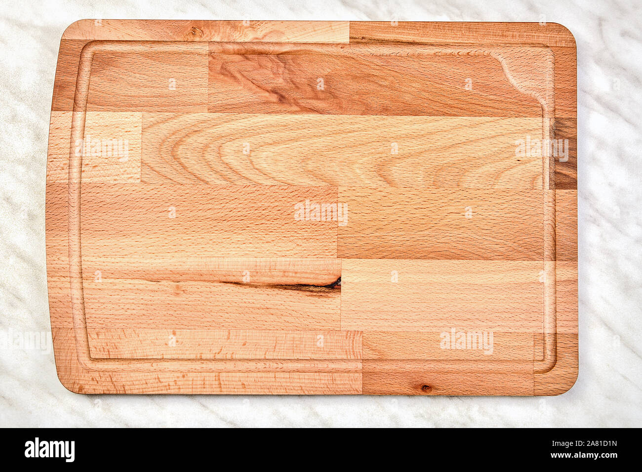 Large Empty Wooden Kitchen Cutting Board Made Of Birch Wood Lies