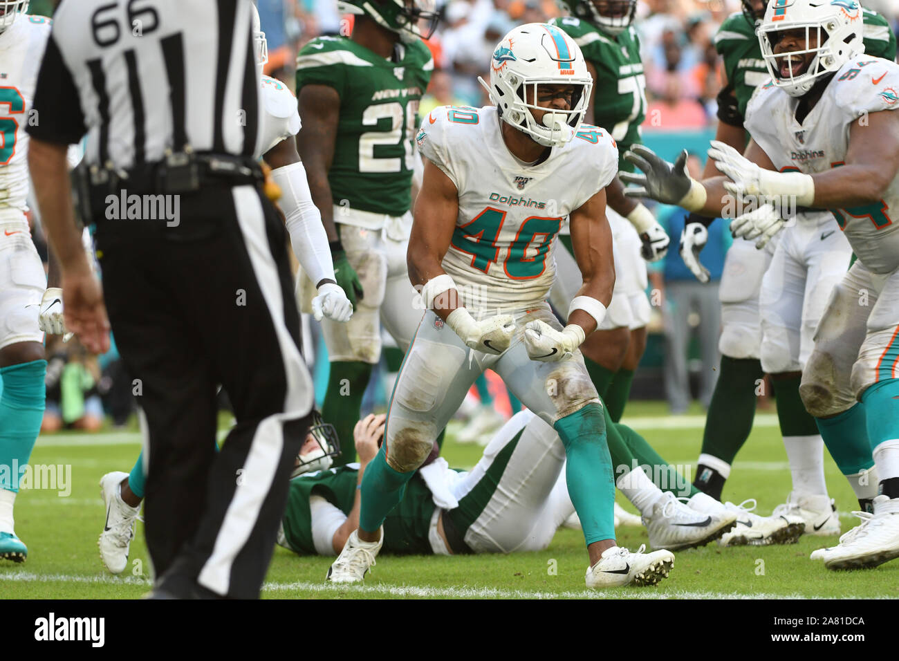 November 3, 2019: Nik Needham #40 of Miami sacks Sam Darnold #14 of New  York during