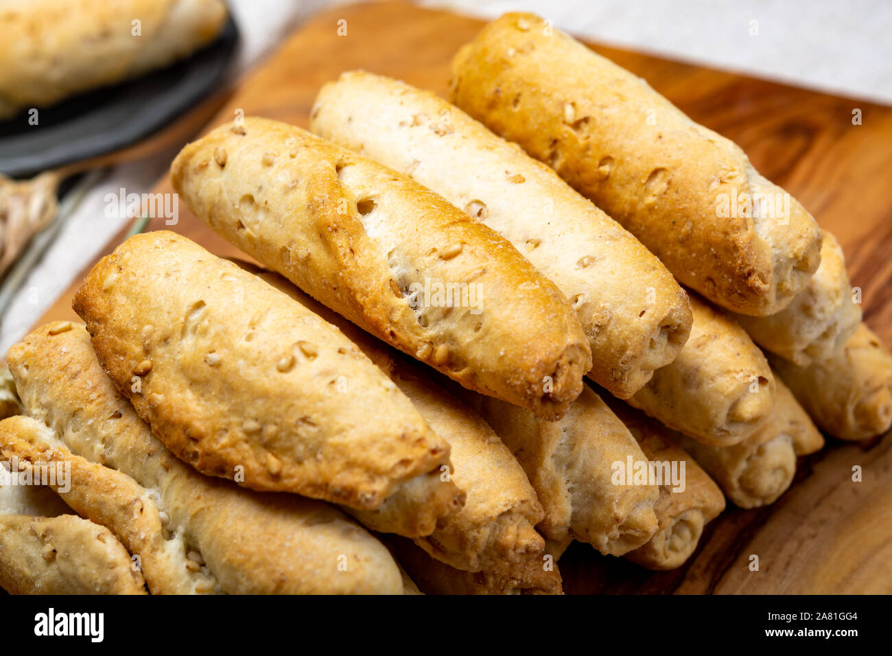 Small italian bread rolls crostini made from wheat dough with sesame close up Stock Photo