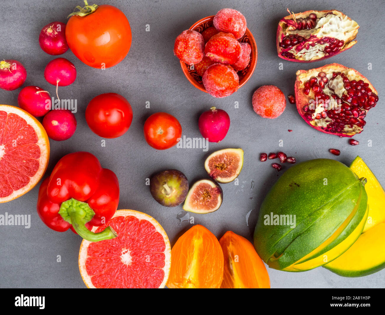 fresh red, orange, yellow fruit and vegetables rich in antioxidants