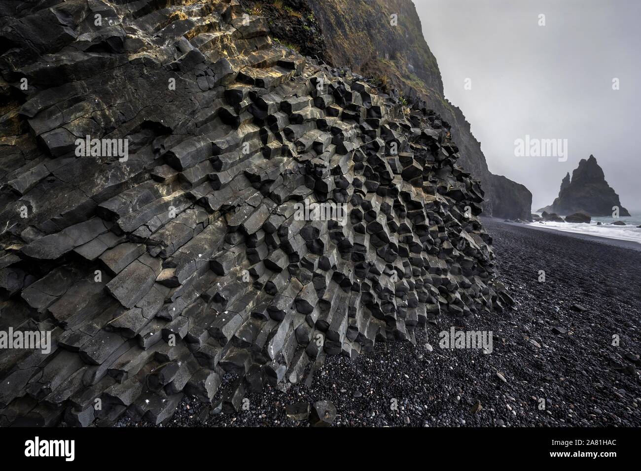 Basalt columns at the black lava edge Reynisfjara, near Vik, South Iceland, Iceland Stock Photo