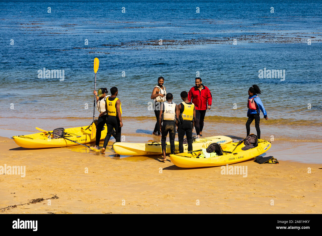 A group of people learning to kayak, San Carlos beach, Monterey, California, United States of America. Stock Photo
