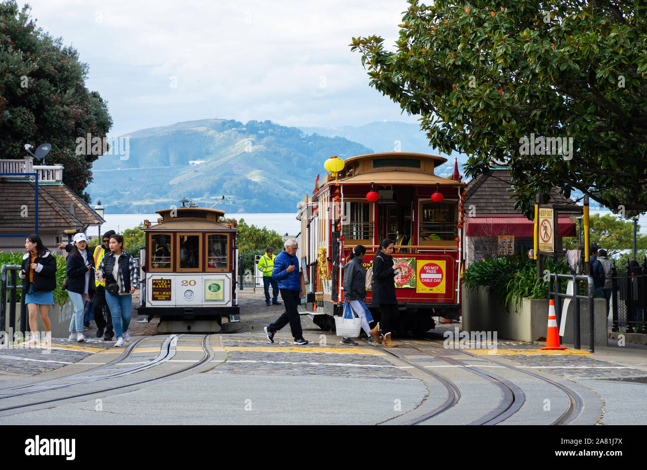 SAN FRANCISCO - February 08, 2019: Cable car on San Francisco streets. It’s the world's last manually operated cable car system and is the icon of the Stock Photo
