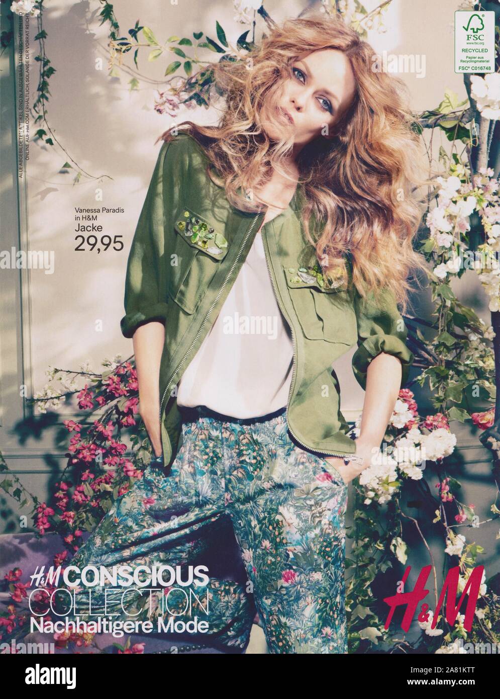 poster advertising H&M fashion house with Vanessa Paradis in paper magazine  from 2013 year, advertisement, creative Hennes & Mauritz advert from 2010s  Stock Photo - Alamy