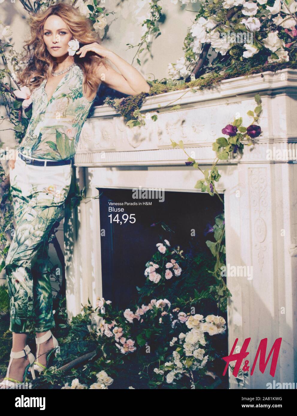 poster advertising H&M fashion house with Vanessa Paradis in paper magazine  from 2013 year, advertisement, creative Hennes & Mauritz advert from 2010s  Stock Photo - Alamy