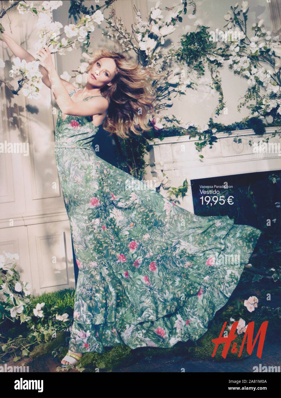 poster advertising H&M fashion house with Vanessa Paradis in paper magazine  from 2013 year, advertisement, creative Hennes & Mauritz advert from 2010s  Stock Photo - Alamy