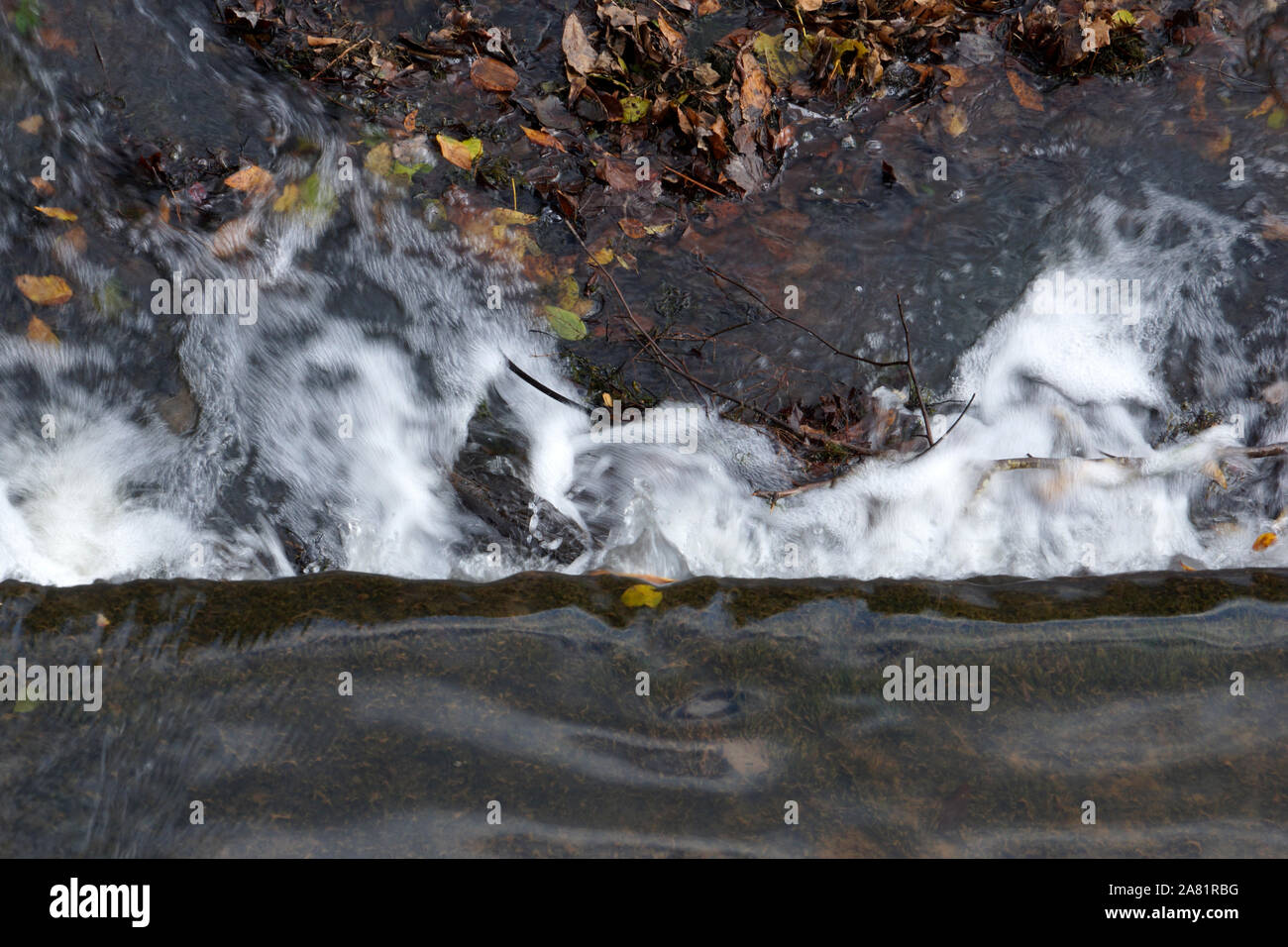 Gray rock and blue water hi-res stock photography and images - Alamy