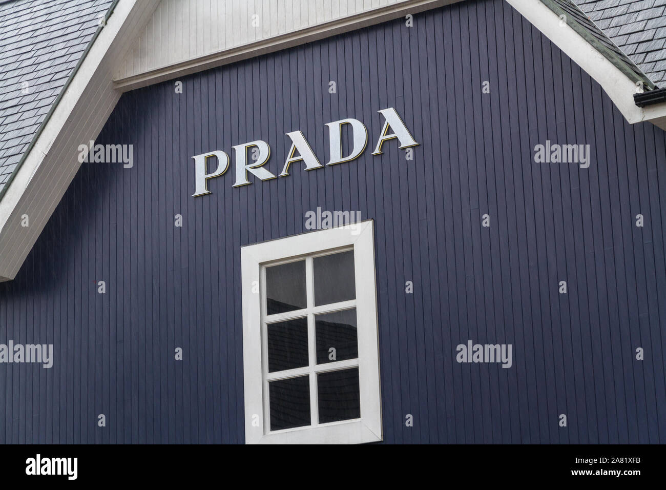 Bicester Village outlet, England , Sign or logo of Prada on April 04 2019  in UK Stock Photo - Alamy