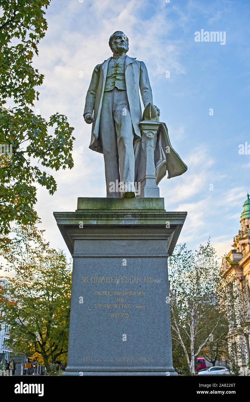 Statue of James Harland, MP for Belfast North, one half of the famous Harland and Woolf shipyard owners, outside City Hall in the centre of Belfast. Stock Photo