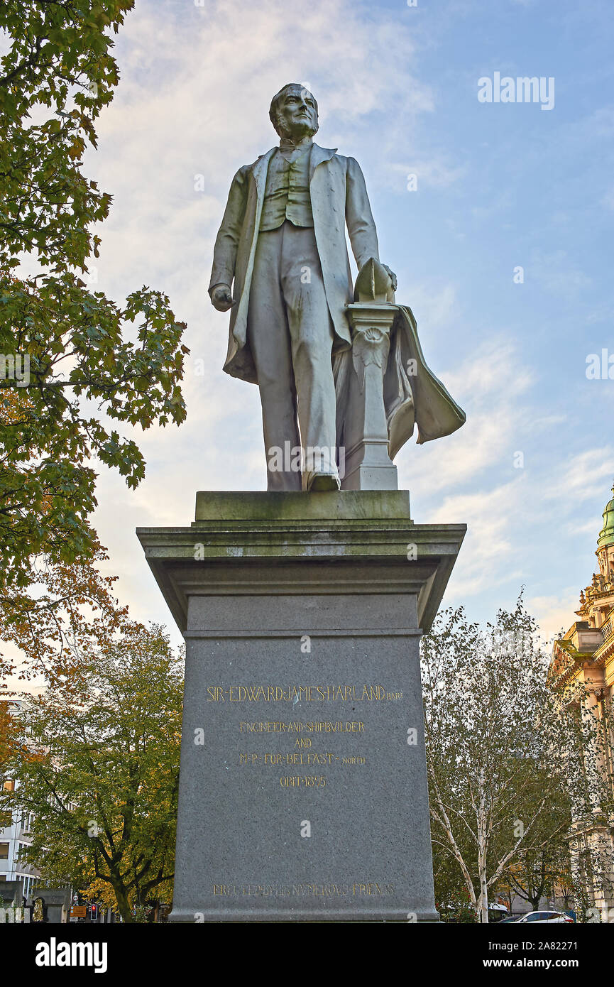 Statue of James Harland, MP for Belfast North, one half of the famous Harland and Woolf shipyard owners, outside City Hall in the centre of Belfast. Stock Photo