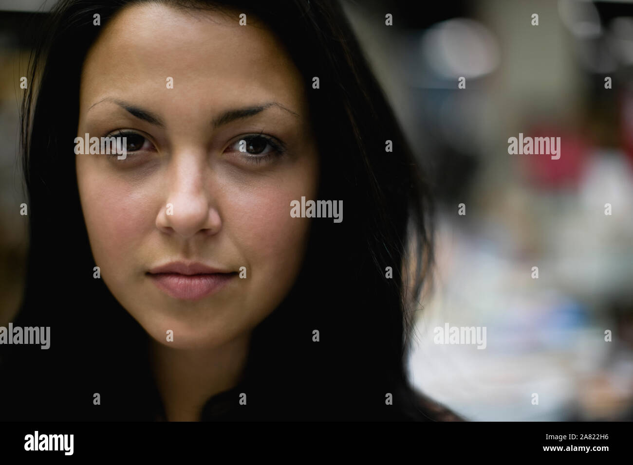 Young stern looking woman brown hi-res stock photography and images - Alamy