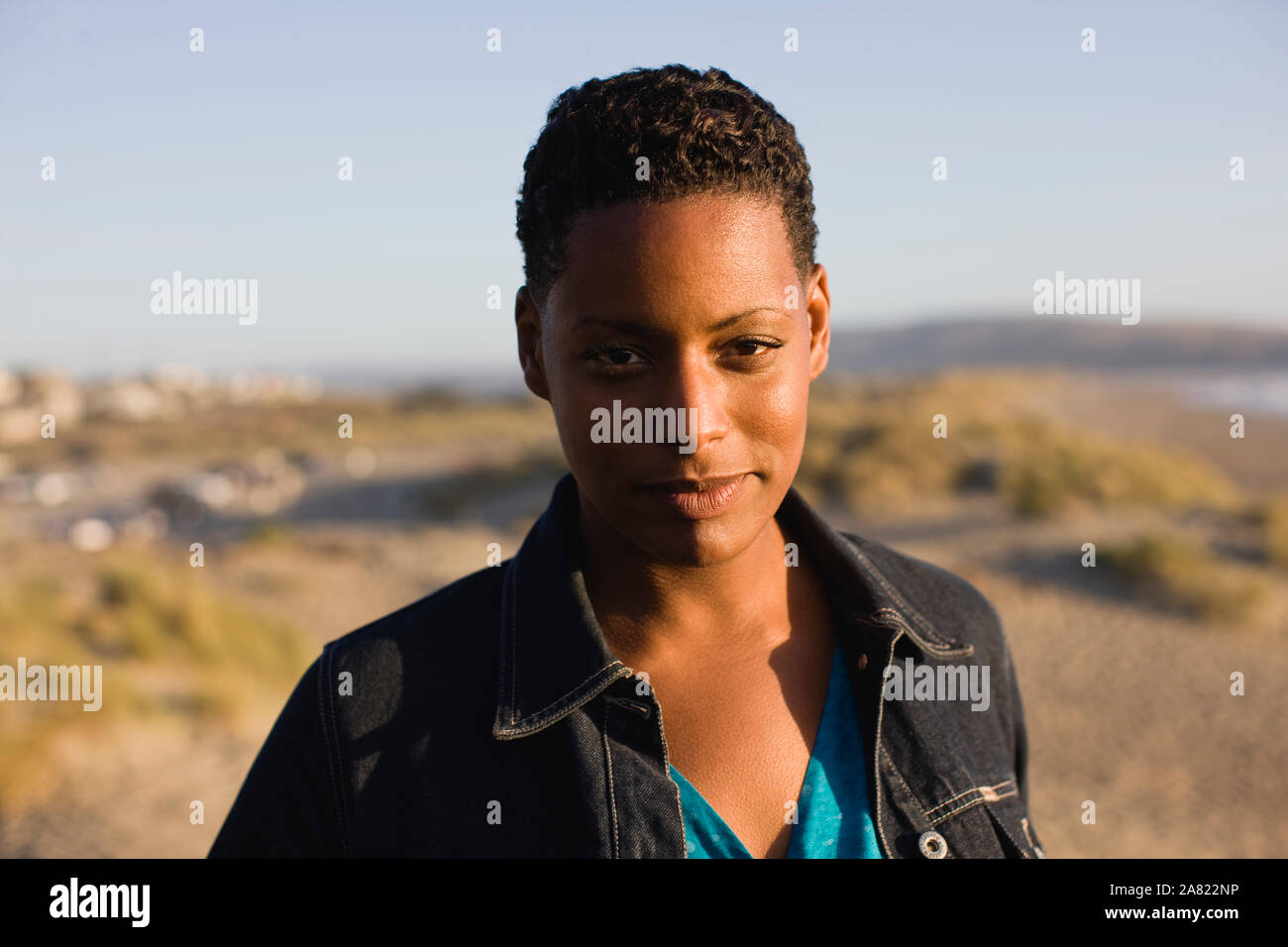 Outdoor portrait of a woman on the beach Stock Photo - Alamy
