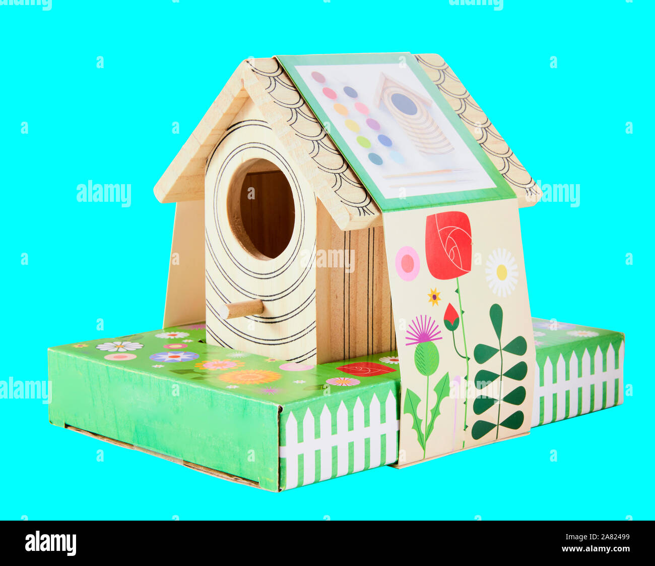 Classic Bird house toy for kids isolated on cyan background with