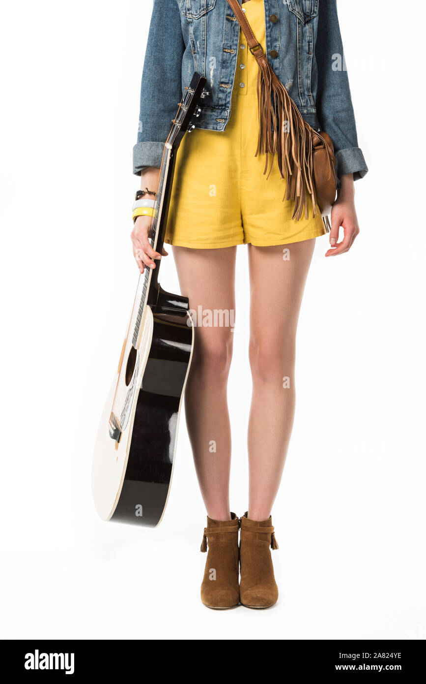 cropped view of boho girl holding acoustic guitar isolated on white Stock Photo