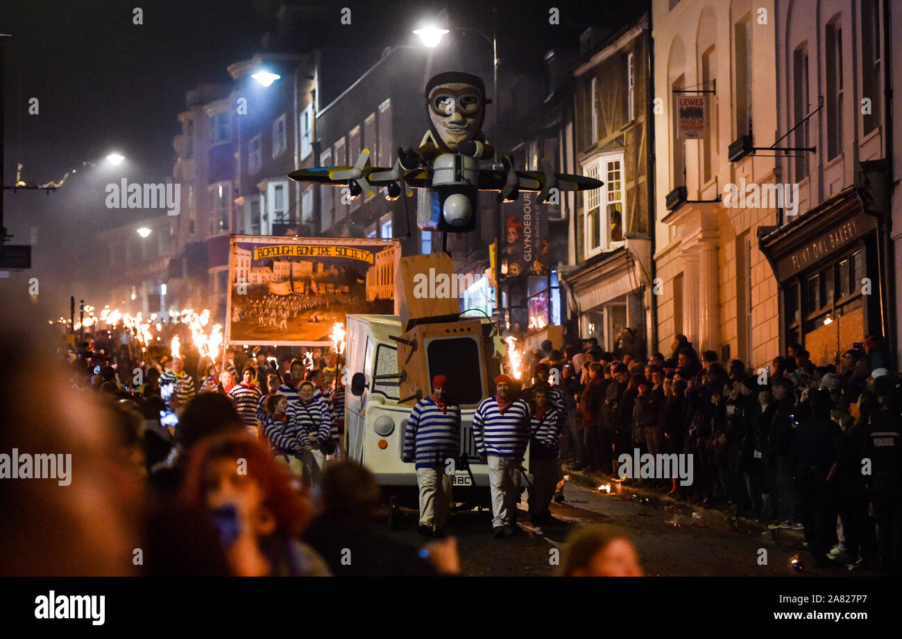 Lewes UK 5th November 2019 - Thousands take part and watch the annual Lewes Bonfire celebrations remembering the failure of the Guy Fawkes gunpowder plot of 1605 .The Lewes Bonfire Night Celebrations are the largest 'Fifth of November' event in the world with the six town bonfire societies taking part and over 30 processions taking place throughout the evening : Credit Simon Dack / Alamy Live News Stock Photo