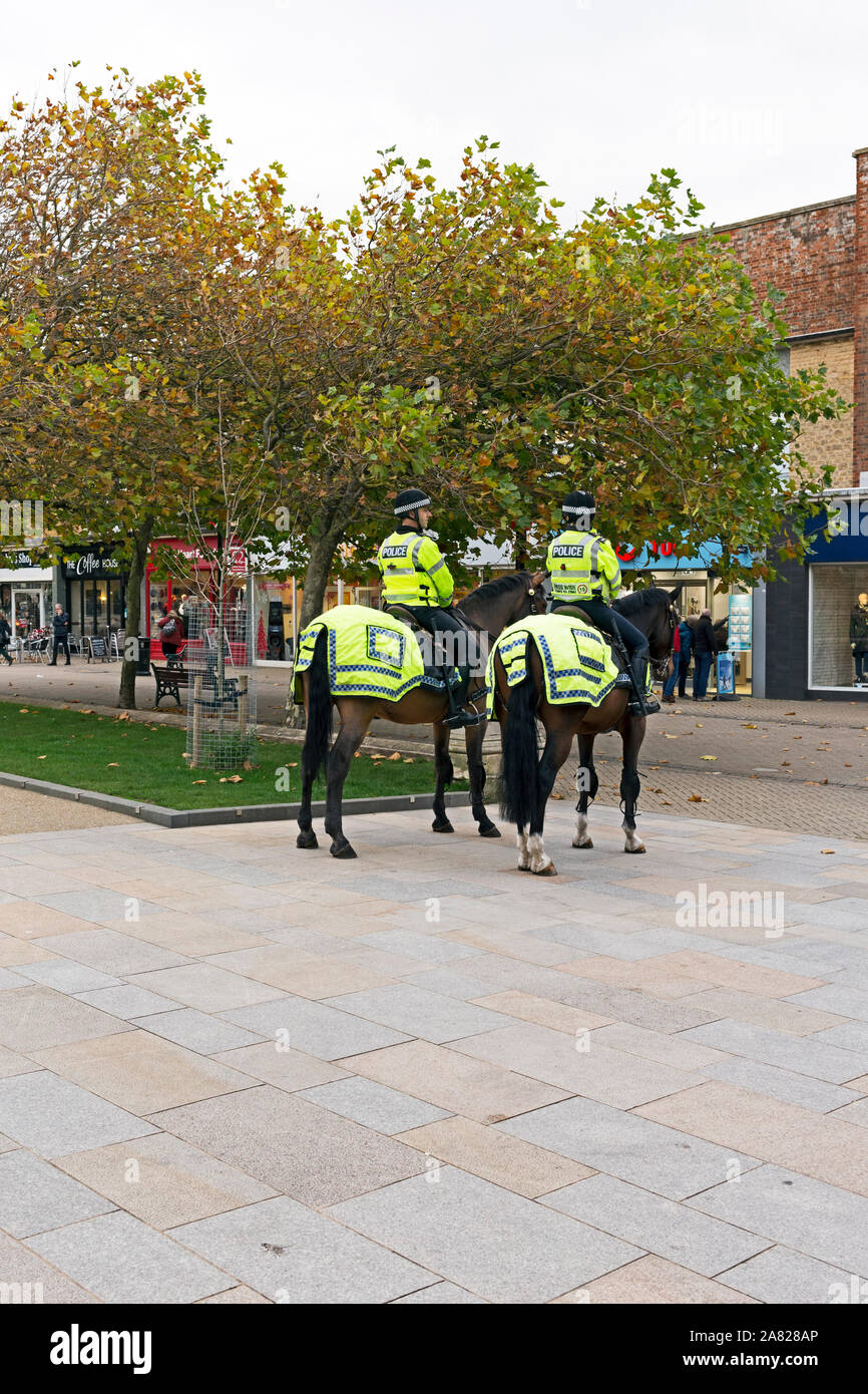 Mounted police officers on patrol in Weston-super-Mare, UK Stock Photo