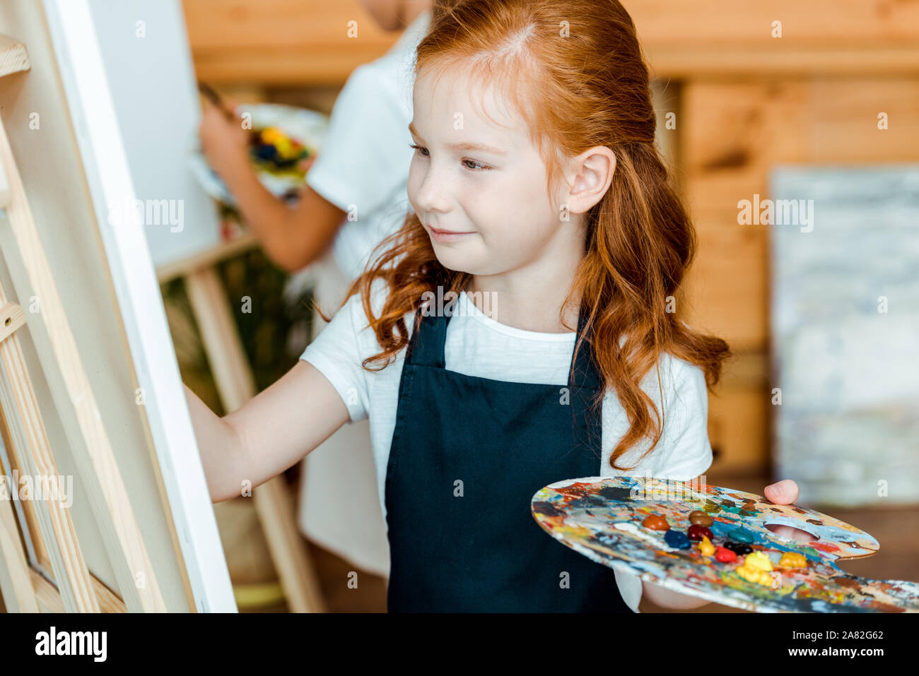 Children hold art in class hi-res stock photography and images - Alamy