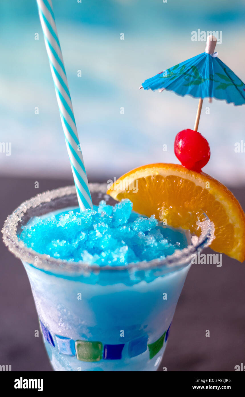 close up of a delicious frozen drink called a blue whale, with ice, lemonade, citrus vodka and curacao blue Stock Photo