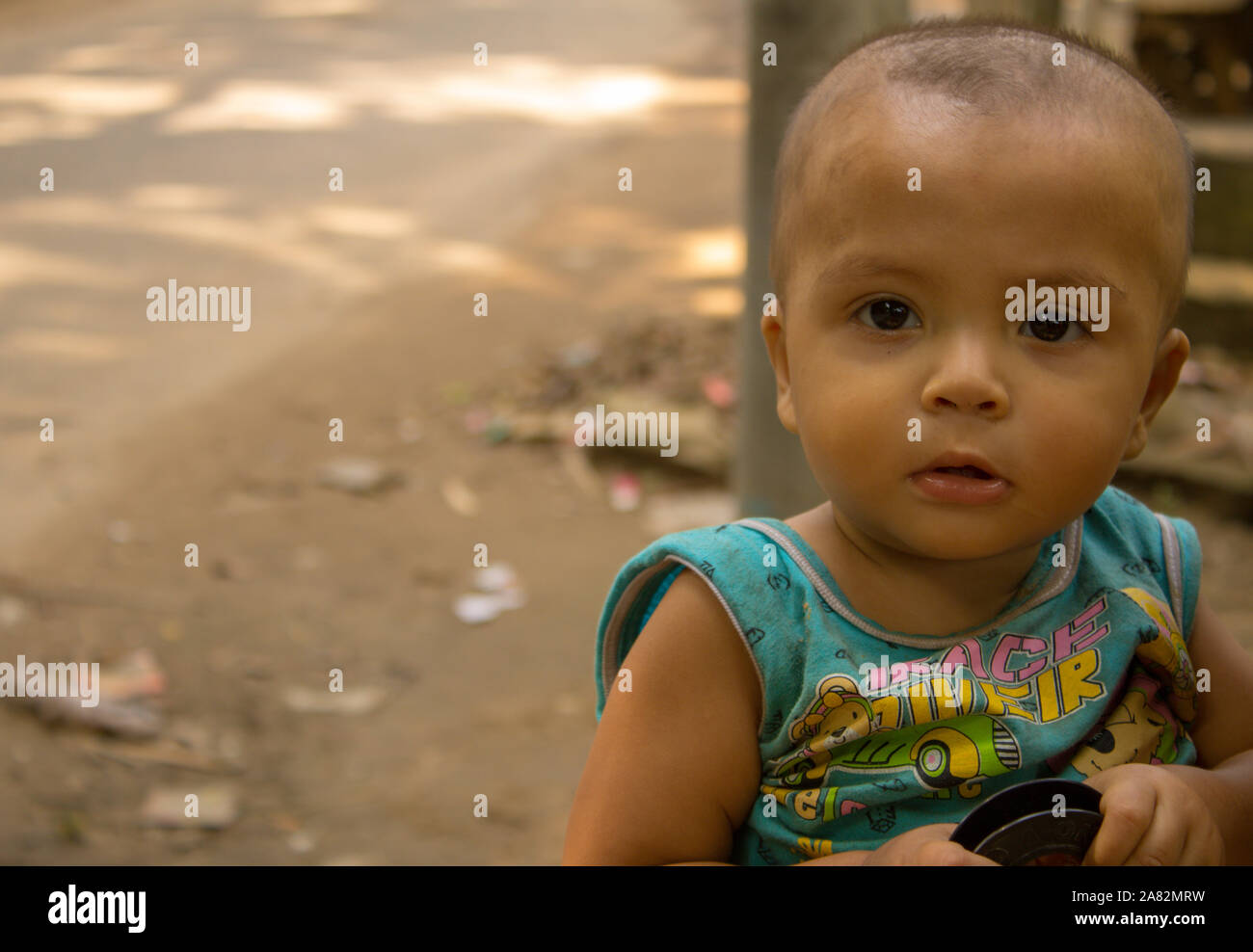 A Cute South Asian Bald Head Toddler Portrait, He is a boy Stock Photo