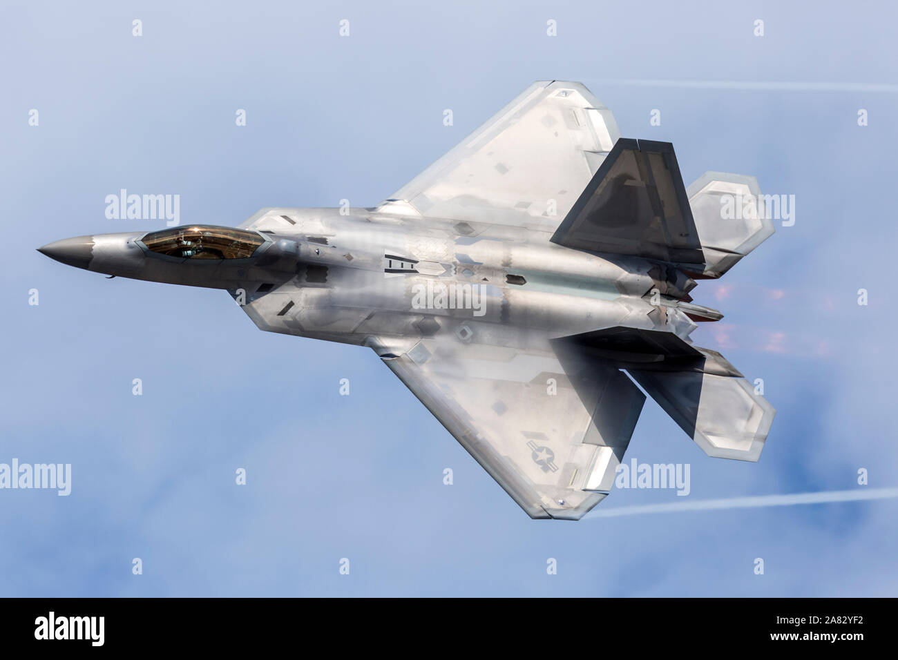 A United States Air Force F-22 Raptor performs at the 2018 Arctic Thunder Airshow. Stock Photo