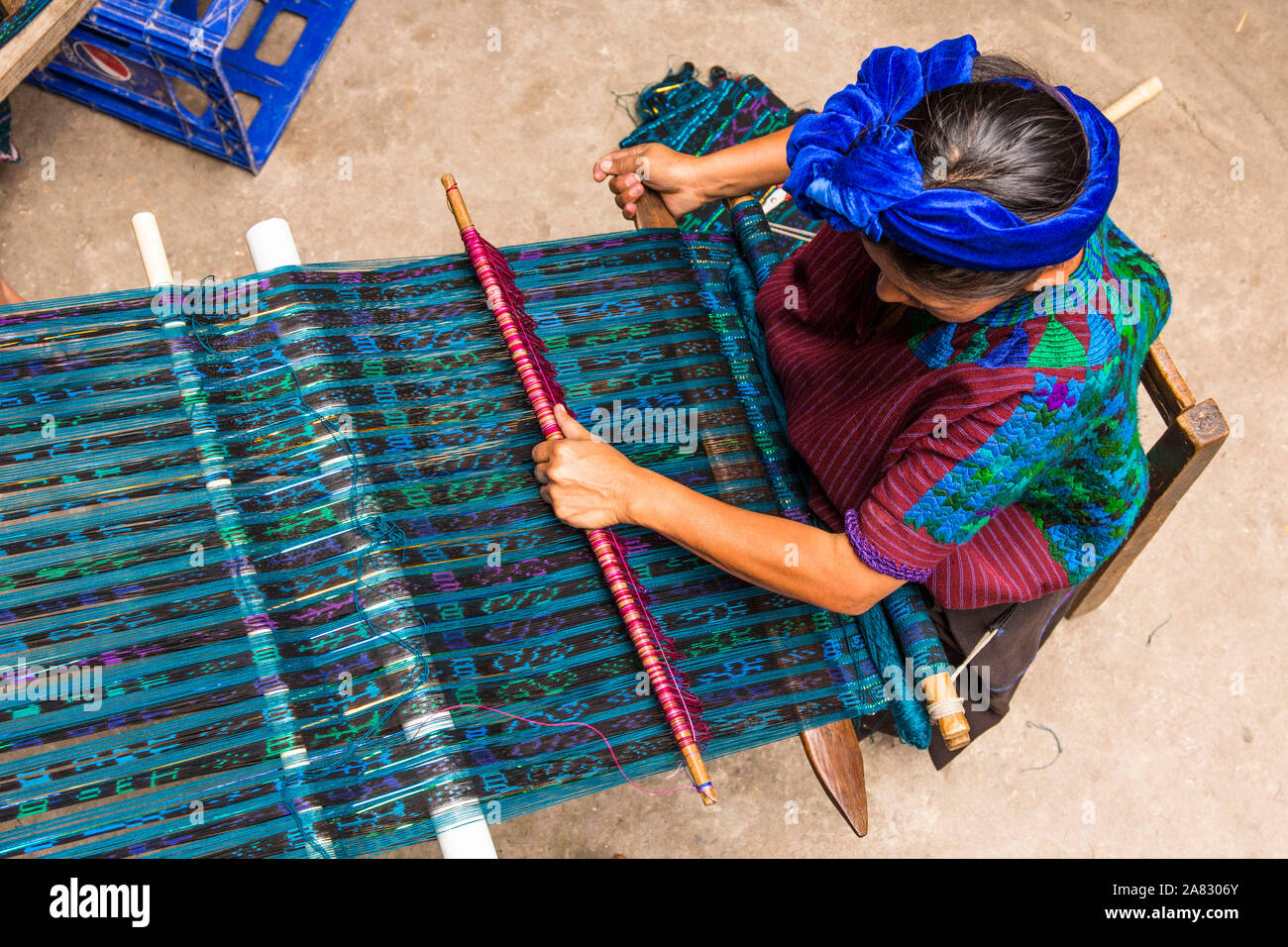 Woman weaves hand loom in hires stock photography and images Alamy