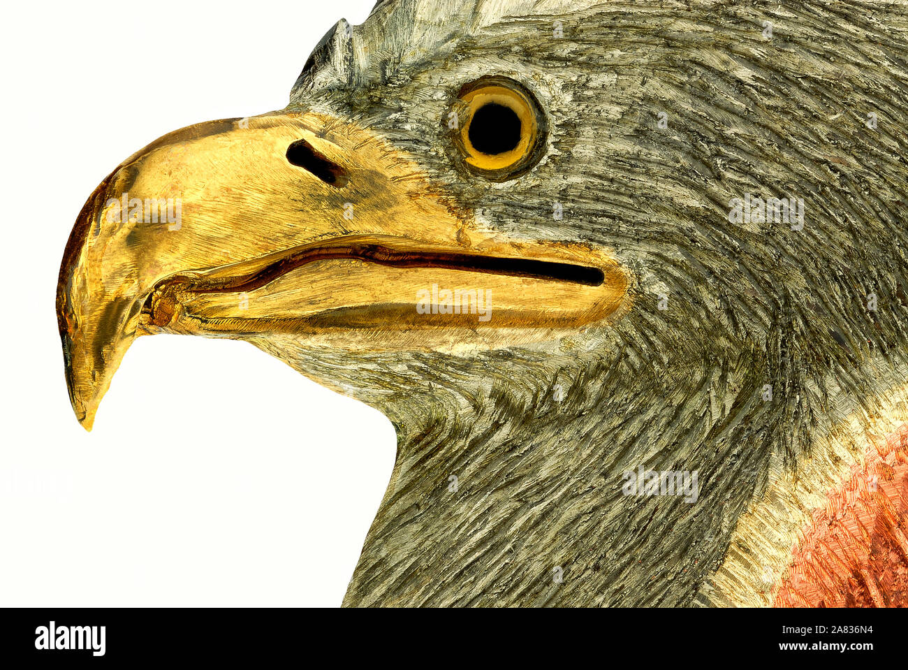 Eagle head sculptured metal medallion, close-up. Stock Photo